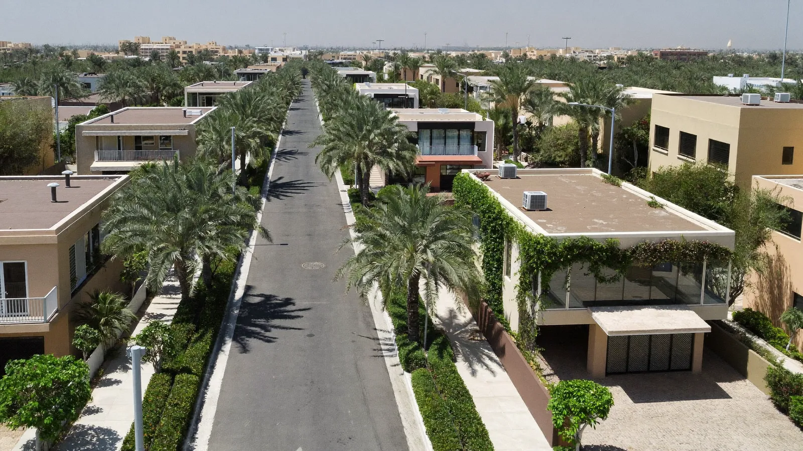 Residential streets and buildings in Jumeirah Village Triangle, Dubai, served for AC repair